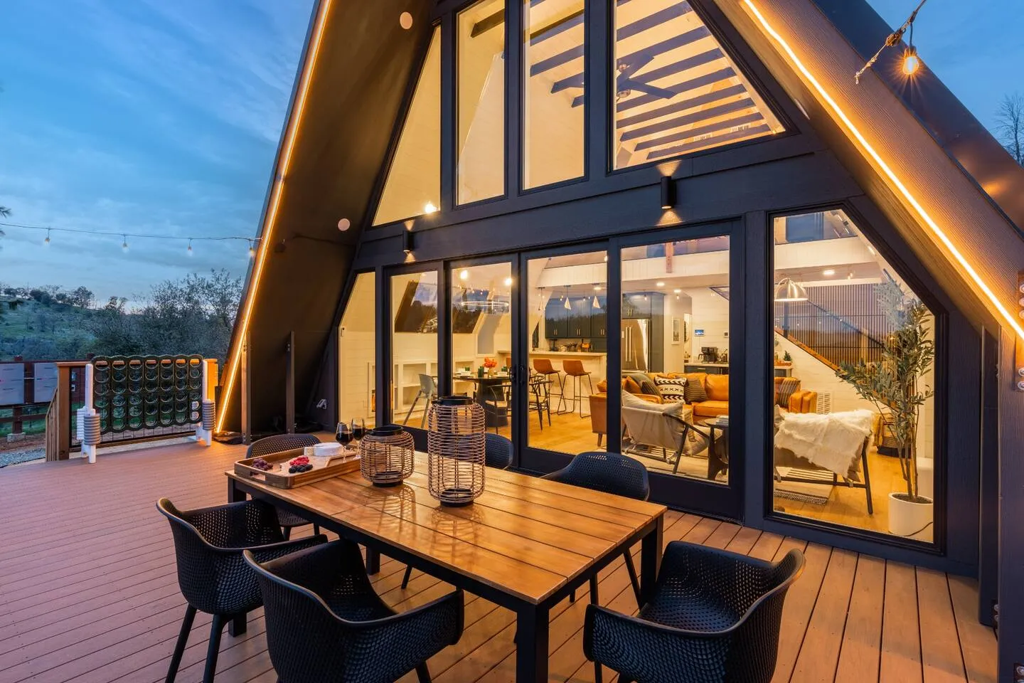Alfresco dining for six on the deck at dusk