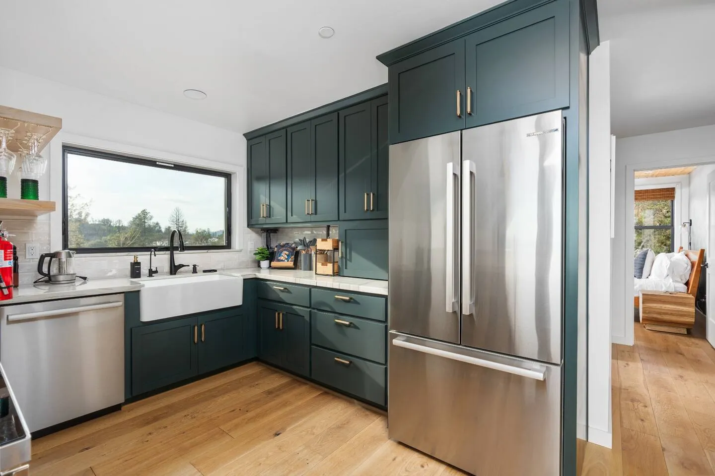 Fully stocked kitchen with full-size fridge and mountain views